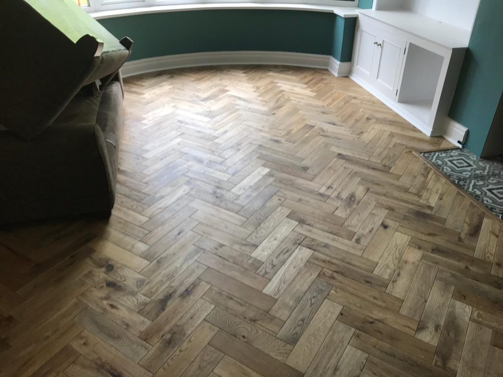 Worn Oak Herringbone Wood Flooring - Lounge Harrogate | Floorstore