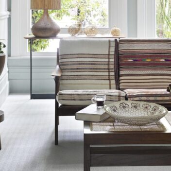 Room setting with chairs and carpet