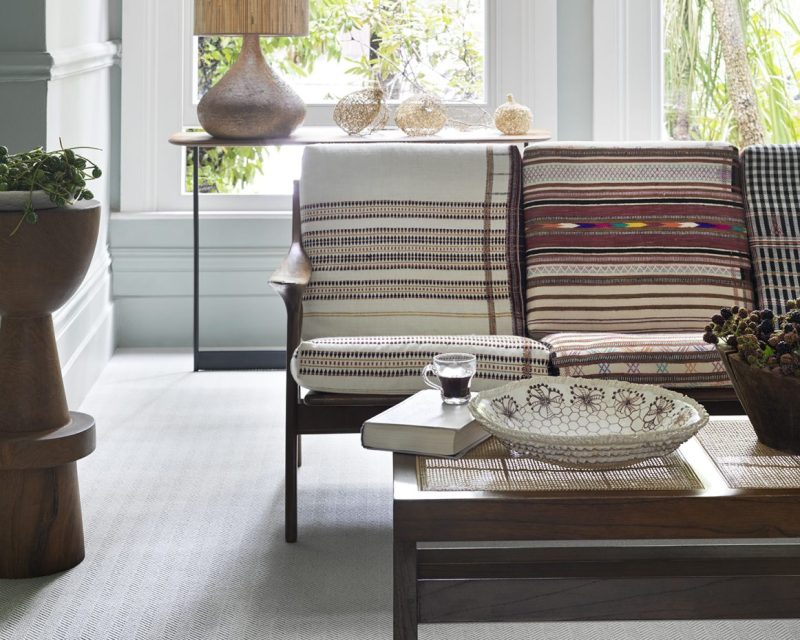 Room setting with chairs and carpet
