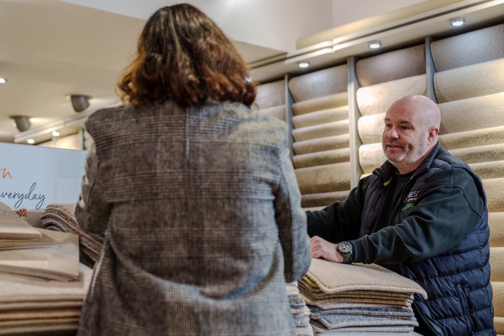 Lee with a customer in Harrogate shop