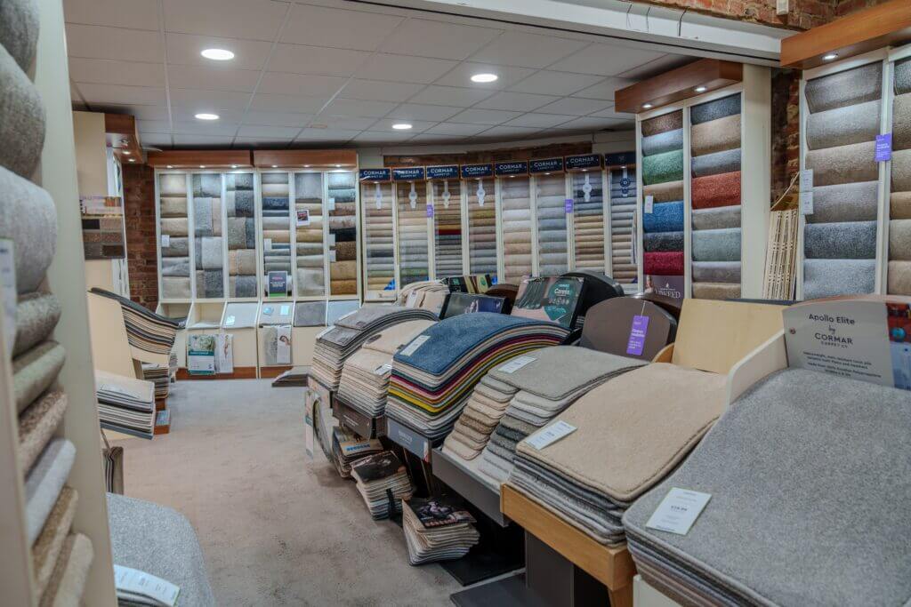 Carpet stands in the back of the outlet
